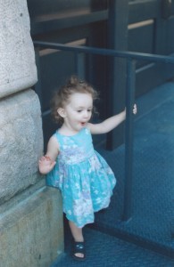 a toddler delights in the intricacies of a loading dock in Tribeca 